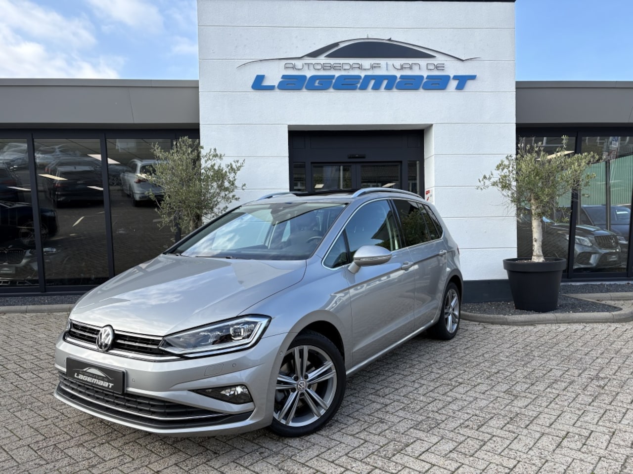 Volkswagen Golf Sportsvan - 1.5 TSI ACT ACT Automaat | Pano | Trekhaak | Massage | Navi | Vol! - AutoWereld.nl