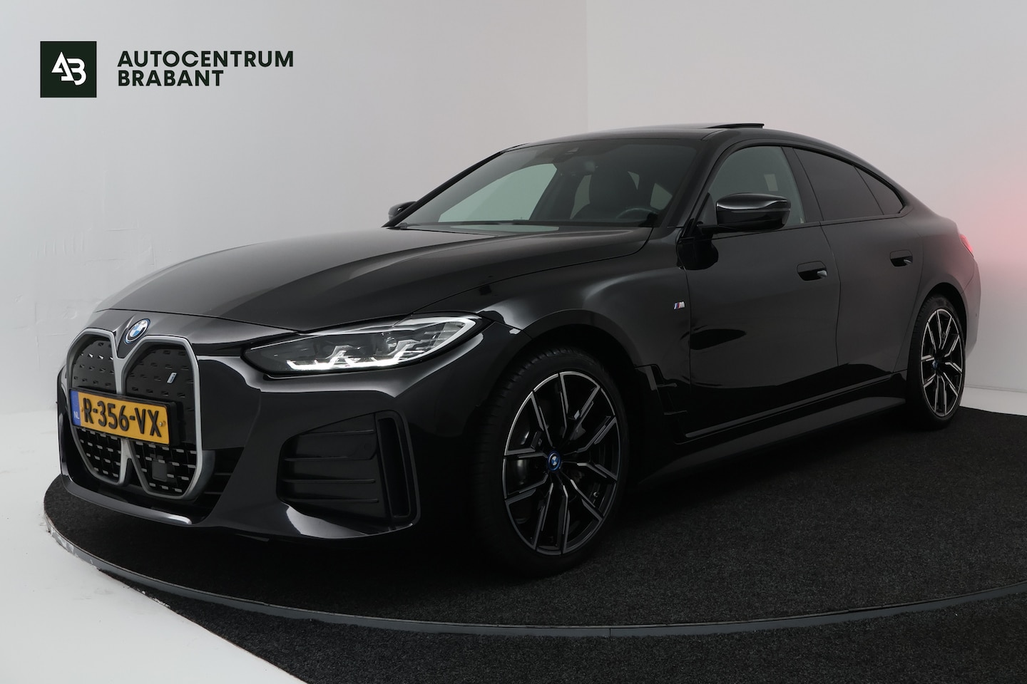 BMW i4 - eDrive40 High Executive 84 kWh (PANORAMADAK, STOELVERWARMING, CARPLAY, LED) - AutoWereld.nl
