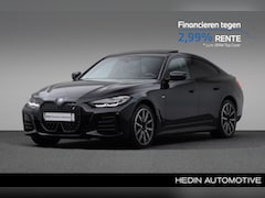 BMW i4 - eDrive40 84 kWh | M-sport Pro. | Comfort Access | M-Sportremsysteem Rot | Harman Kardon |