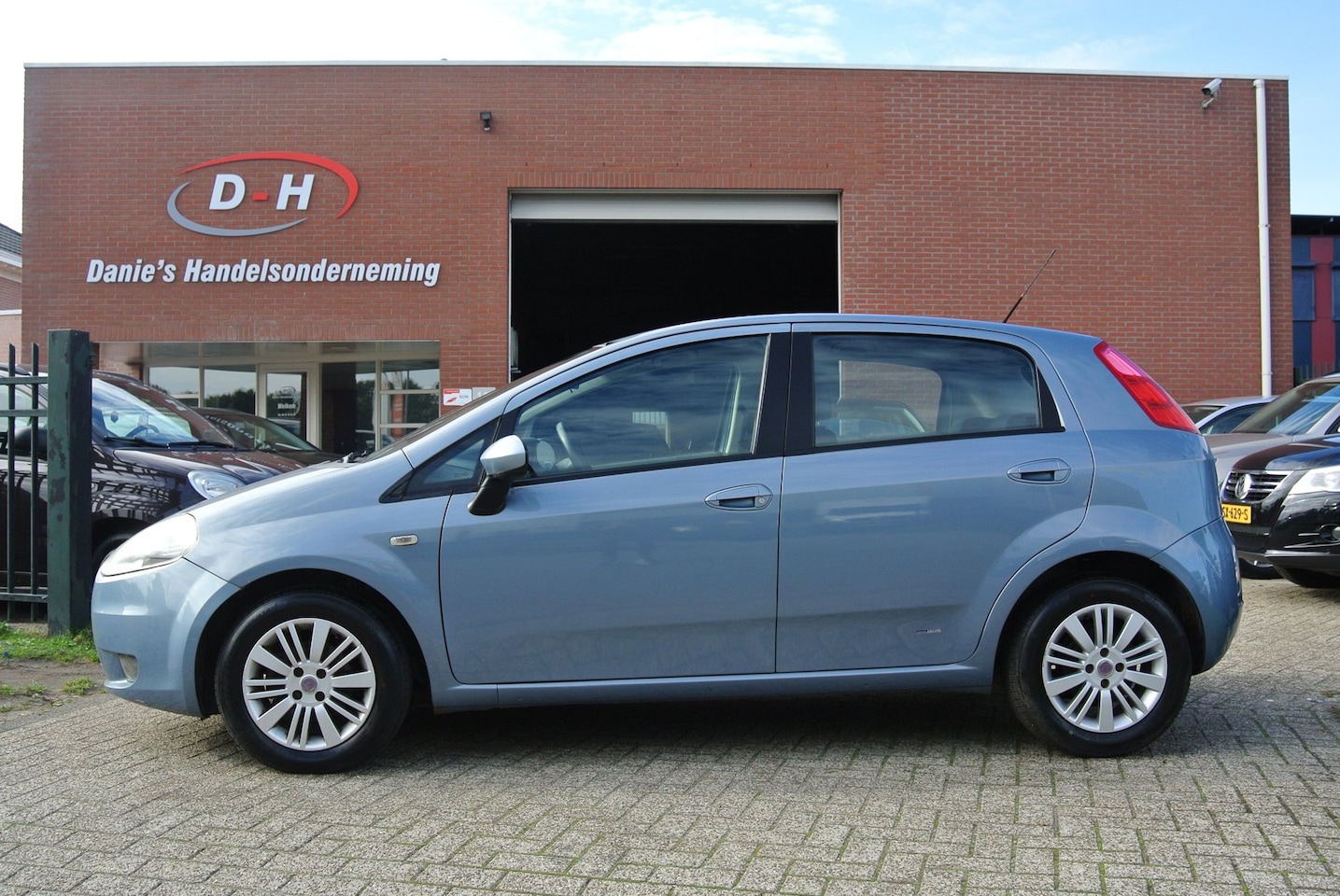 Fiat Grande Punto - 1.4 Edizione Lusso airco nieuwe apk inruil mogelijk nap - AutoWereld.nl