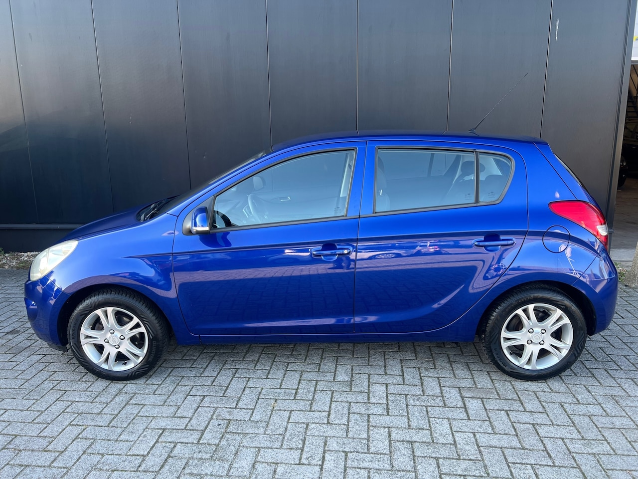 Hyundai i20 - 1.2i '11 5DRS/AIRCO/LMV/CARPLAY/NAP - AutoWereld.nl