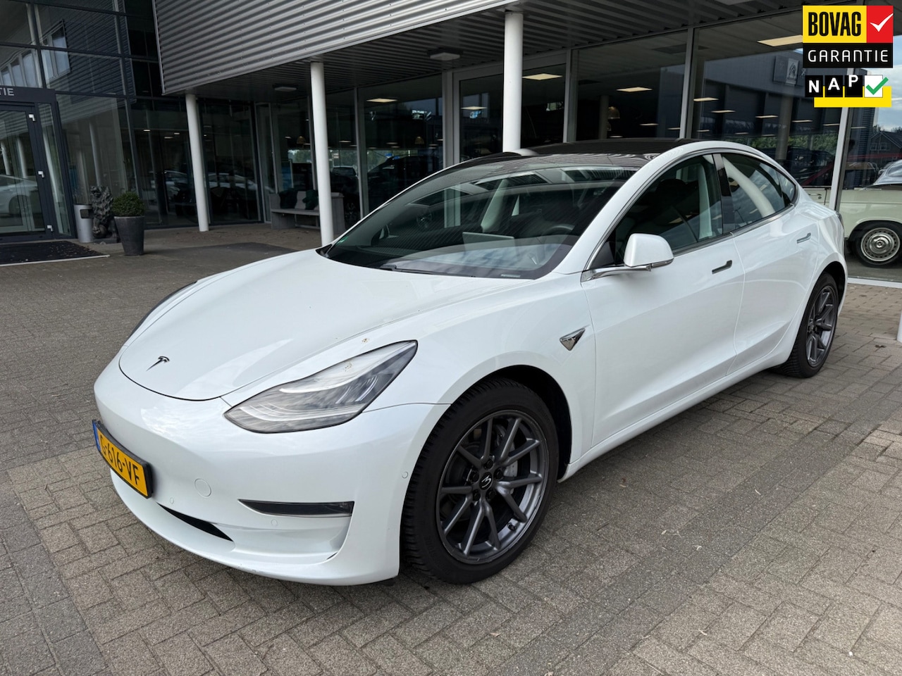 Tesla Model 3 - Long Range AWD 75 kWh SOH 100% / AUTOPILOT / PANO - AutoWereld.nl