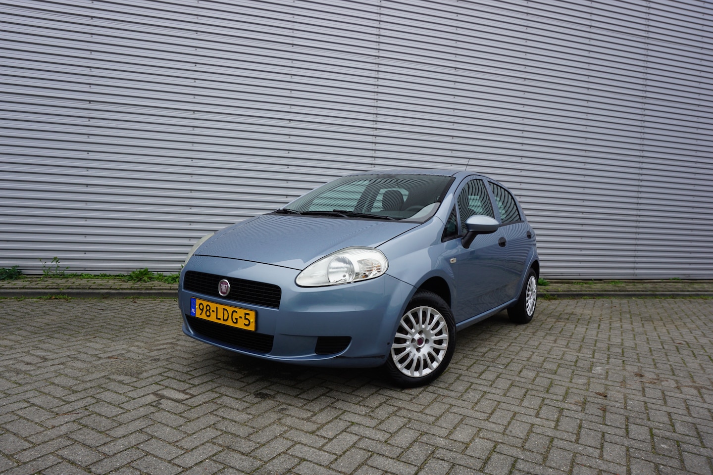 Fiat Grande Punto - 1.2 Actual Airco / Elektr. ramen / Trekhaak / Nieuwe apk! - AutoWereld.nl