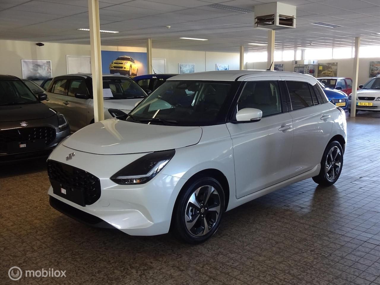 Suzuki Swift - 1.2 Smart Hybrid Style, Nieuw, actie € 2.200, - korting - AutoWereld.nl