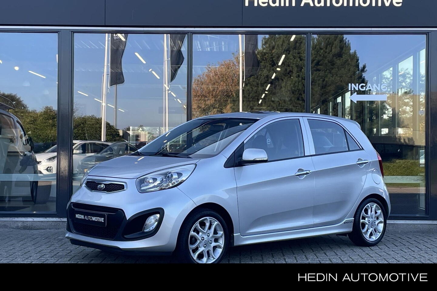 Kia Picanto - 1.2 CVVT ISG Super Pack | Open dak | LM velgen | Navigatie | Climate control | Trekhaak - AutoWereld.nl