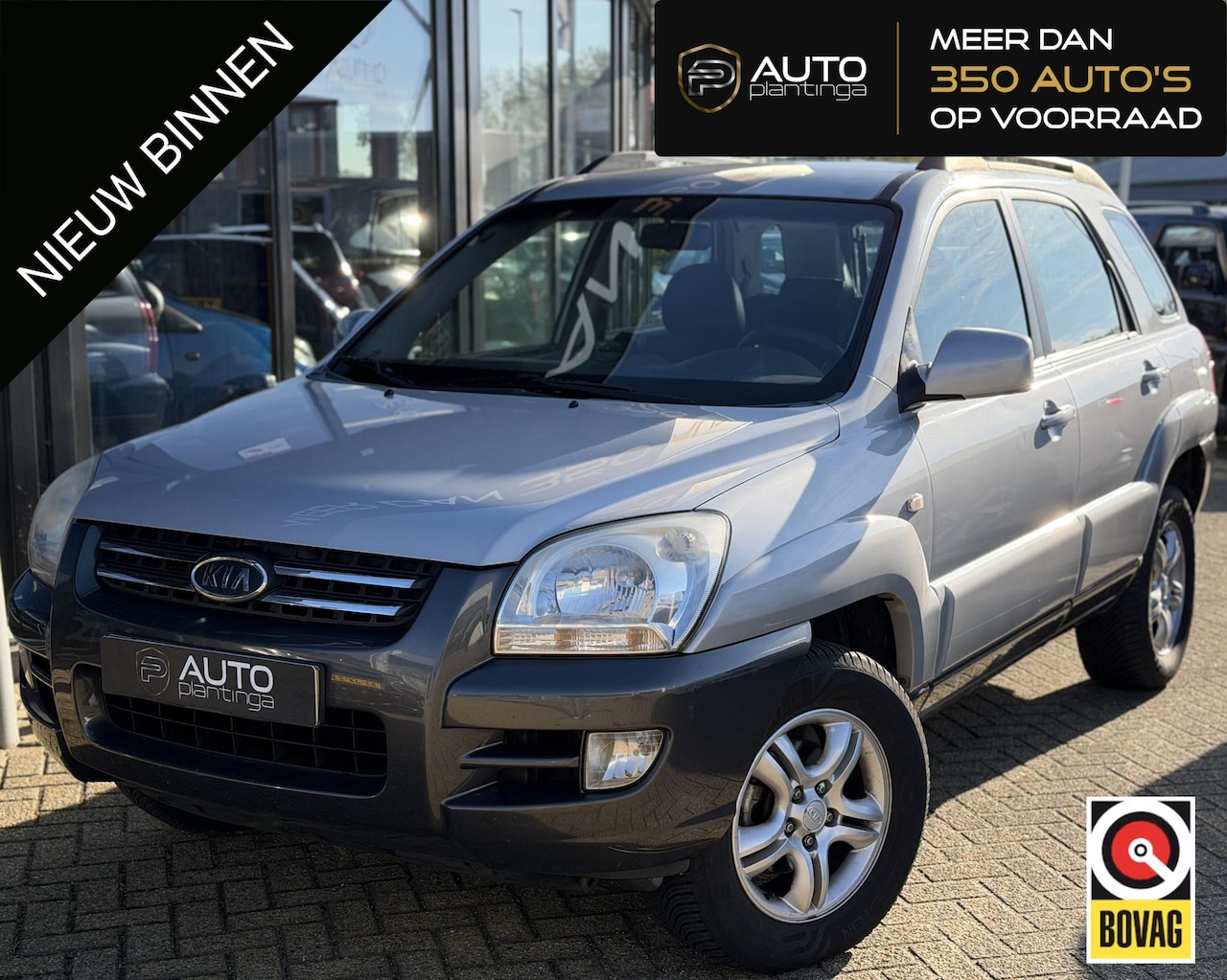 Kia Sportage - 2.0 CVVT Executive 141PK | NL AUTO | NAP | Trekhaak | Climate Control | DAB+ | - AutoWereld.nl