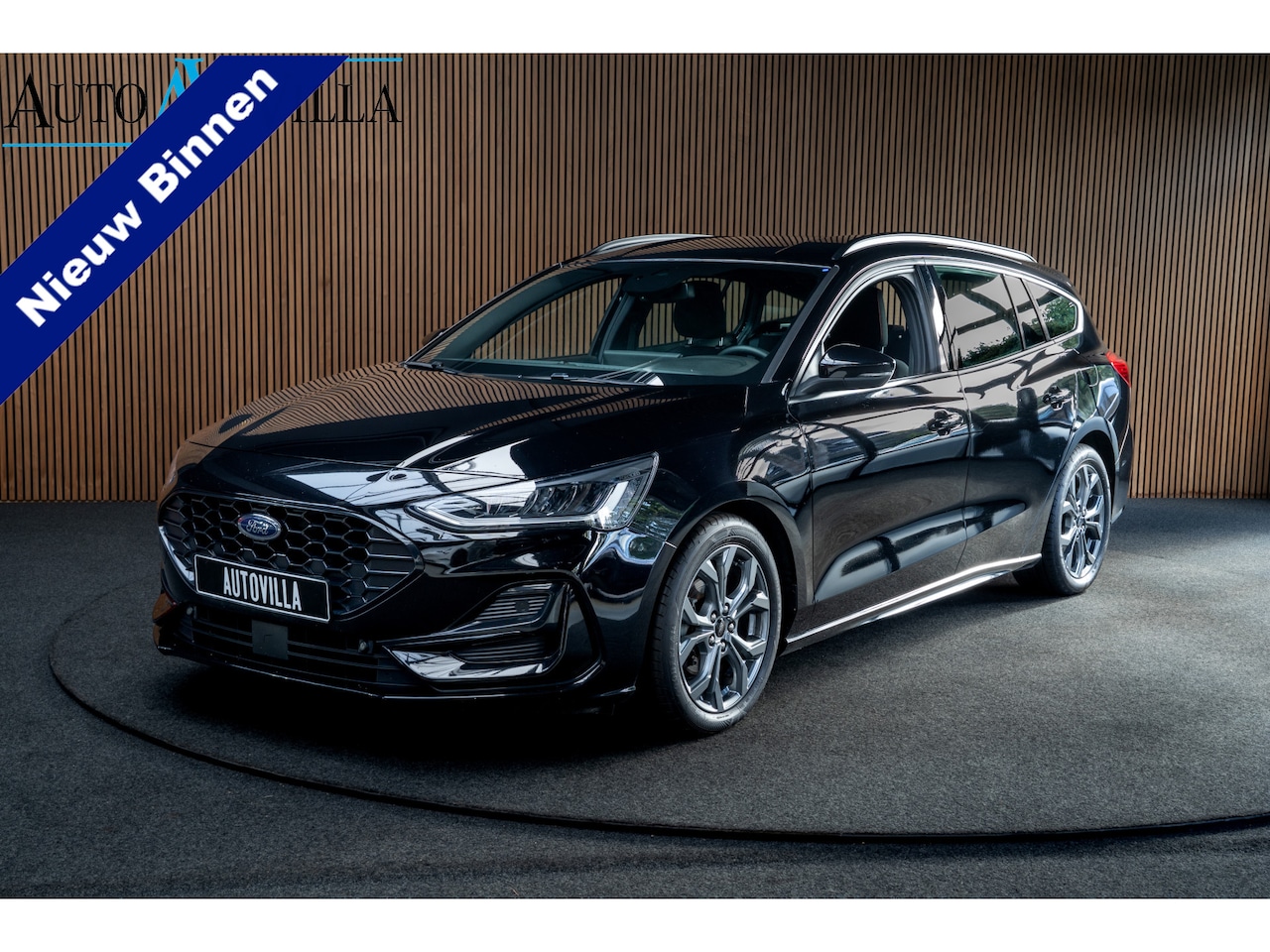 Ford Focus Wagon - 1.0 EcoB Hybrid ST Line Navi Camera Climate PDC LED Zwarte hemelbekleding LM velgen - AutoWereld.nl
