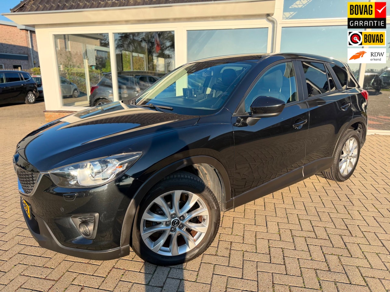 Mazda CX-5 - 2.0 4WD/ Carplay/ Cruise/ Stoel verwarming/ 19''/ 1e eigenaar - AutoWereld.nl
