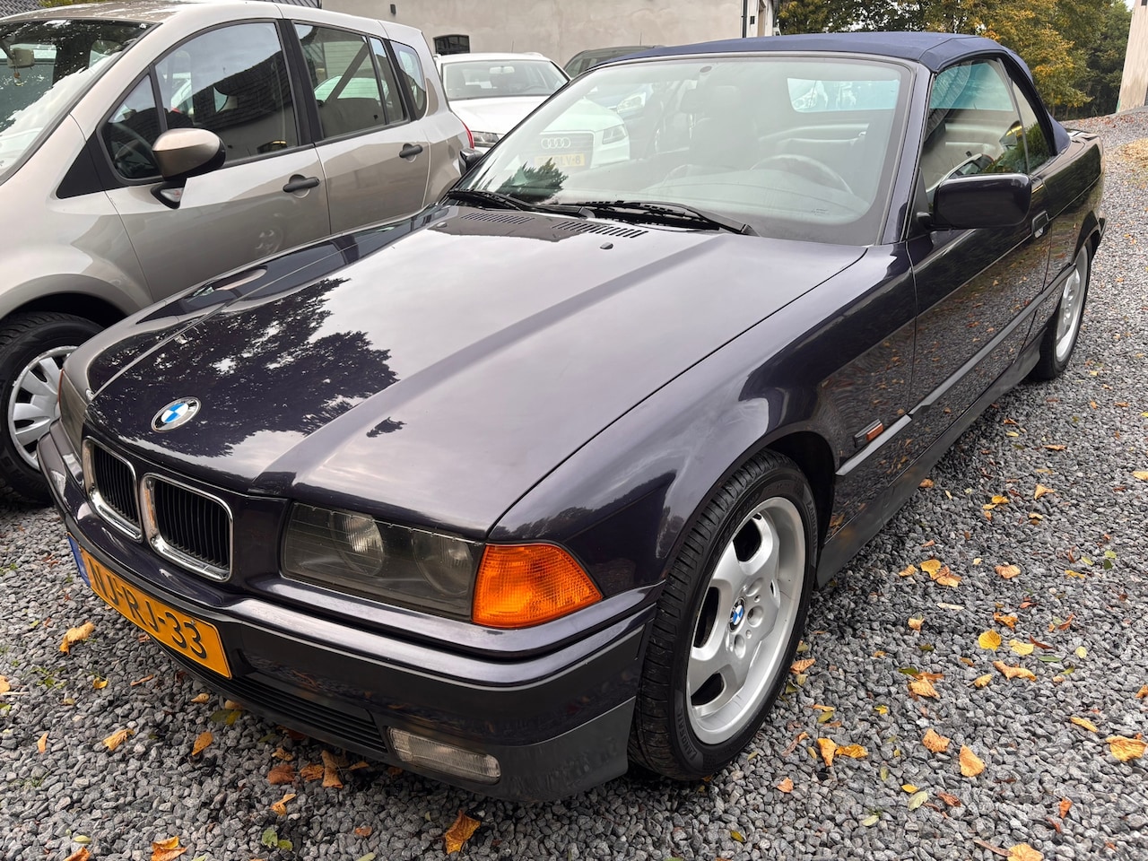 BMW 3-serie Cabrio - 318i Executive NL AUTO NIEUWSTAAT - AutoWereld.nl