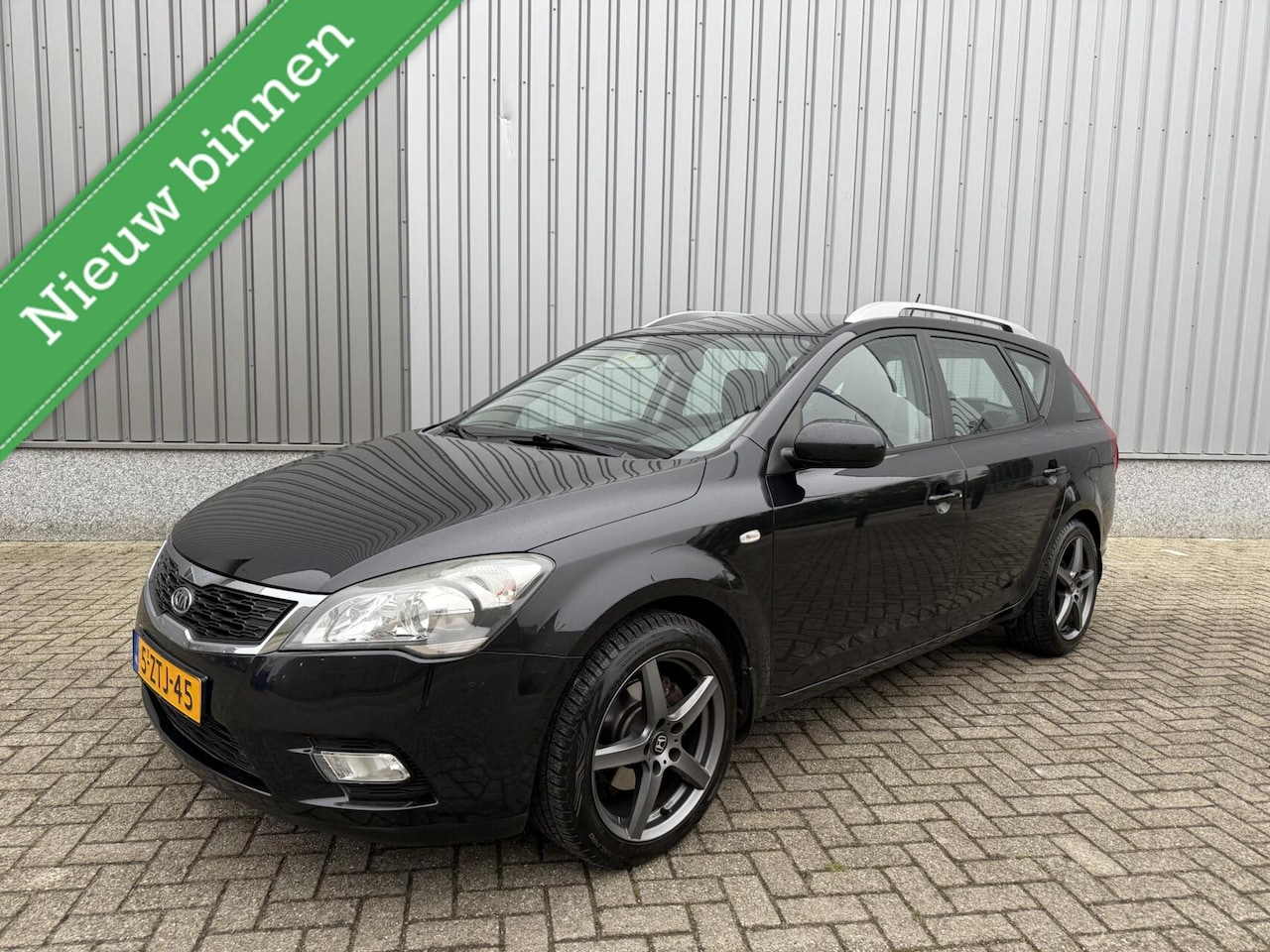 Kia Cee'd Sporty Wagon - 1.4 CVVT X-tra 1.4 CVVT X-tra - AutoWereld.nl