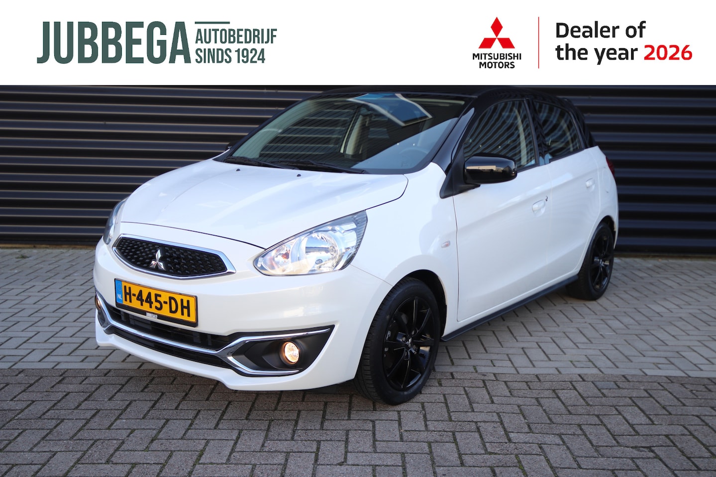 Mitsubishi Space Star - 1.0 Cool+ Bi-Tone 'Black over White' Pearl White met een Attitude Black dak - AutoWereld.nl