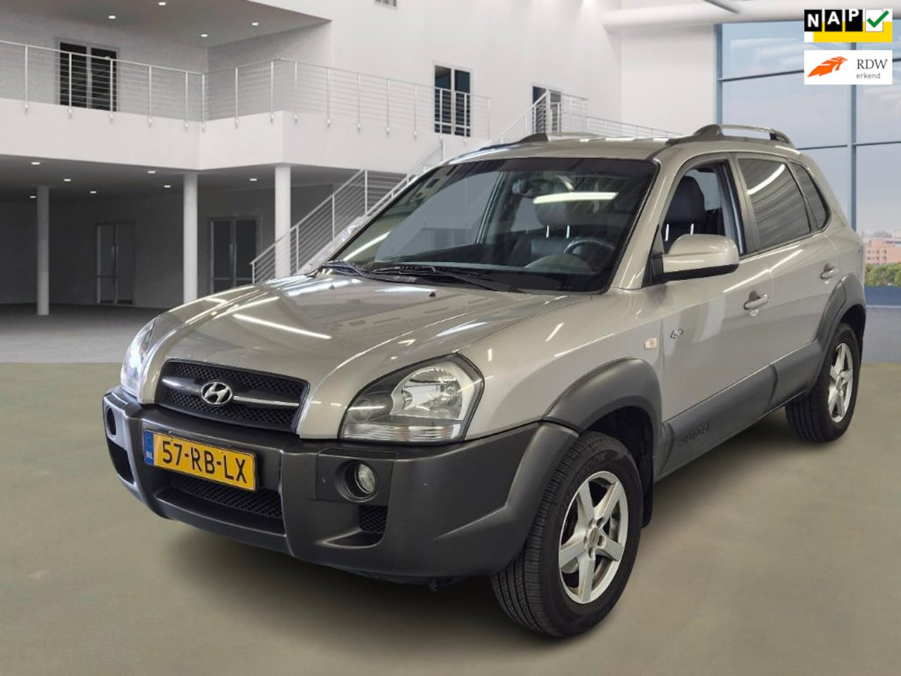 Hyundai Tucson - 2.7i V6 4WD Style 2.7i V6 4WD Style - AutoWereld.nl