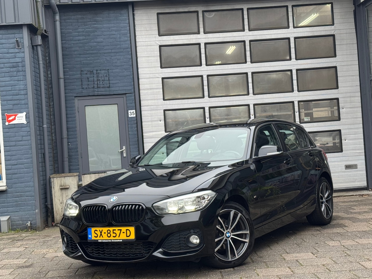 BMW 1-serie - 118i M-Sport | Airco | Navi | Cruise | 5-DRS - AutoWereld.nl