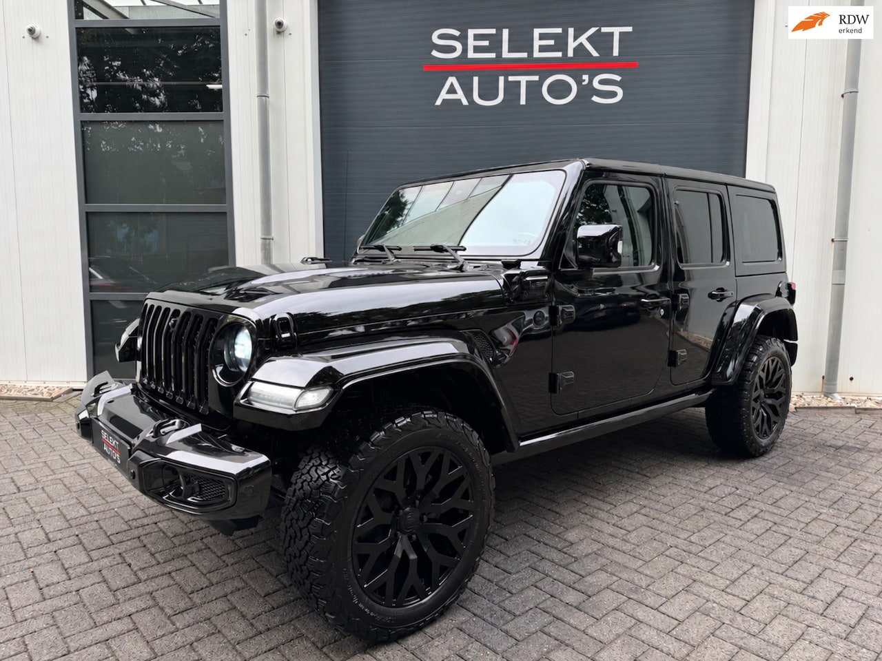 Jeep Wrangler Unlimited - 4xe 380 Rubicon BTW BRUTE Leder/20 Inch/360 Camera/Climate/Keyless/LED/Alpine/Stoelverwarm - AutoWereld.nl