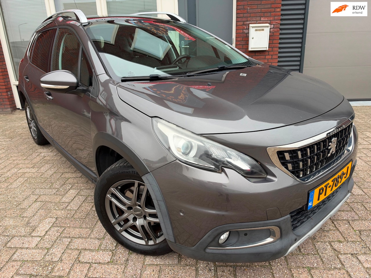 Peugeot 2008 - 1.2 PureTech GT-line / Leder / Camera / PDC / Cruise / Clima - AutoWereld.nl