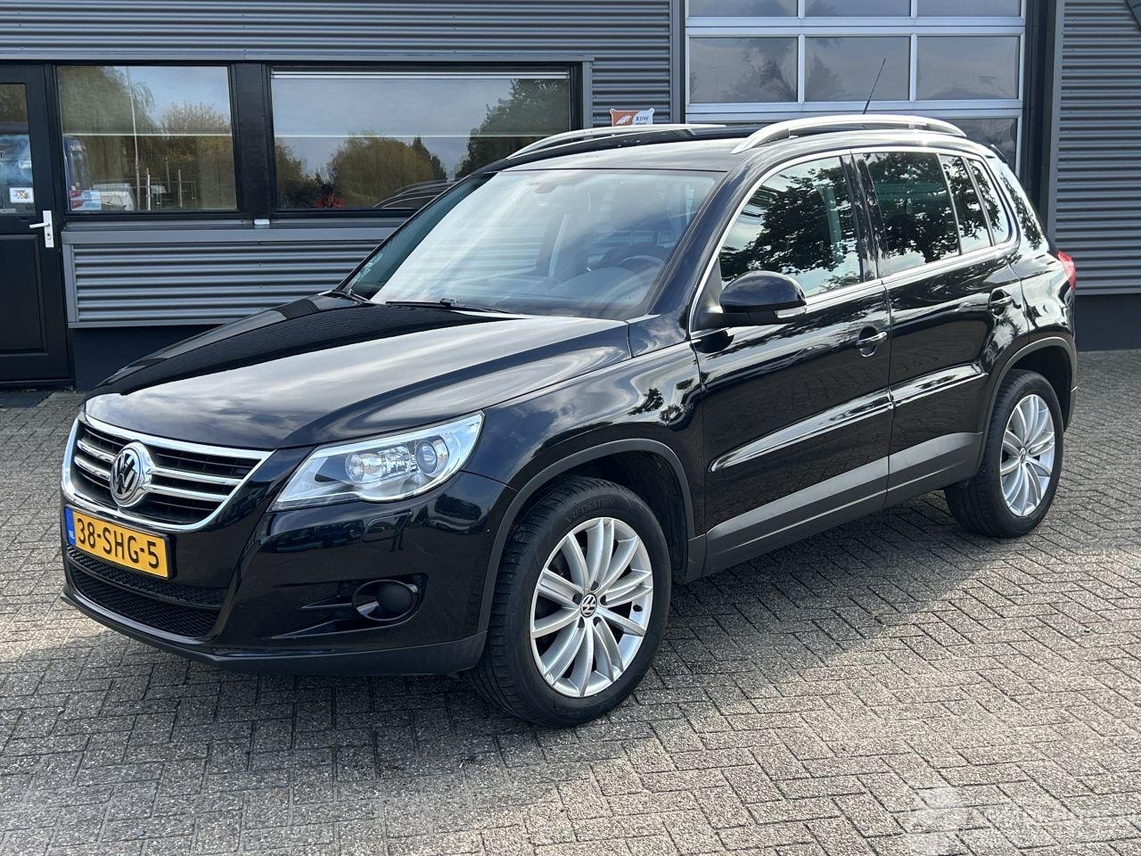 Volkswagen Tiguan - 2.0 TDI Sport&Style 4Motion Automaat - AutoWereld.nl