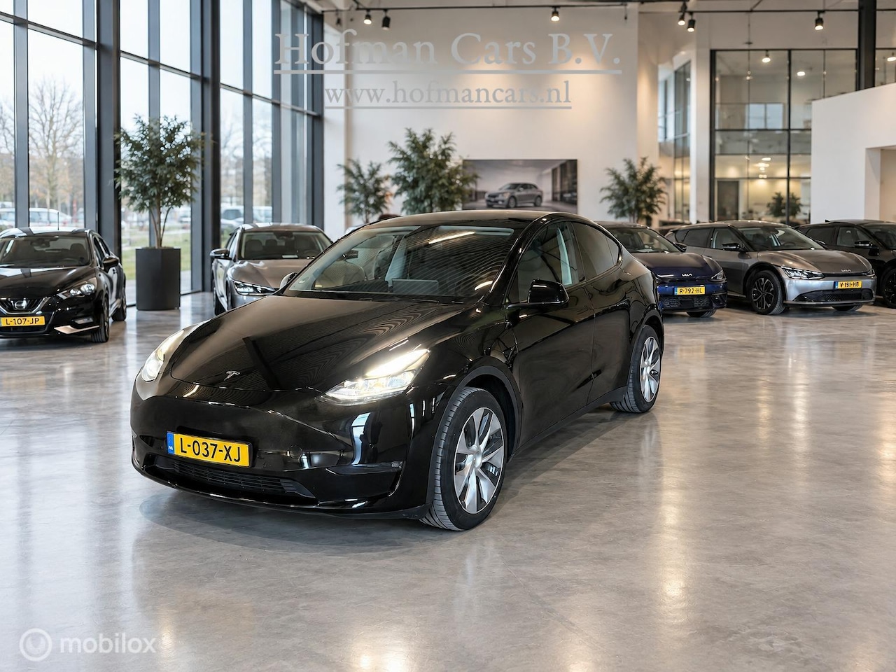 Tesla Model Y - Long Range AWD 75kWh | SOH 91% MOBA | Accugarantie 08/2029 | Basic Autopilot HW3 - AutoWereld.nl