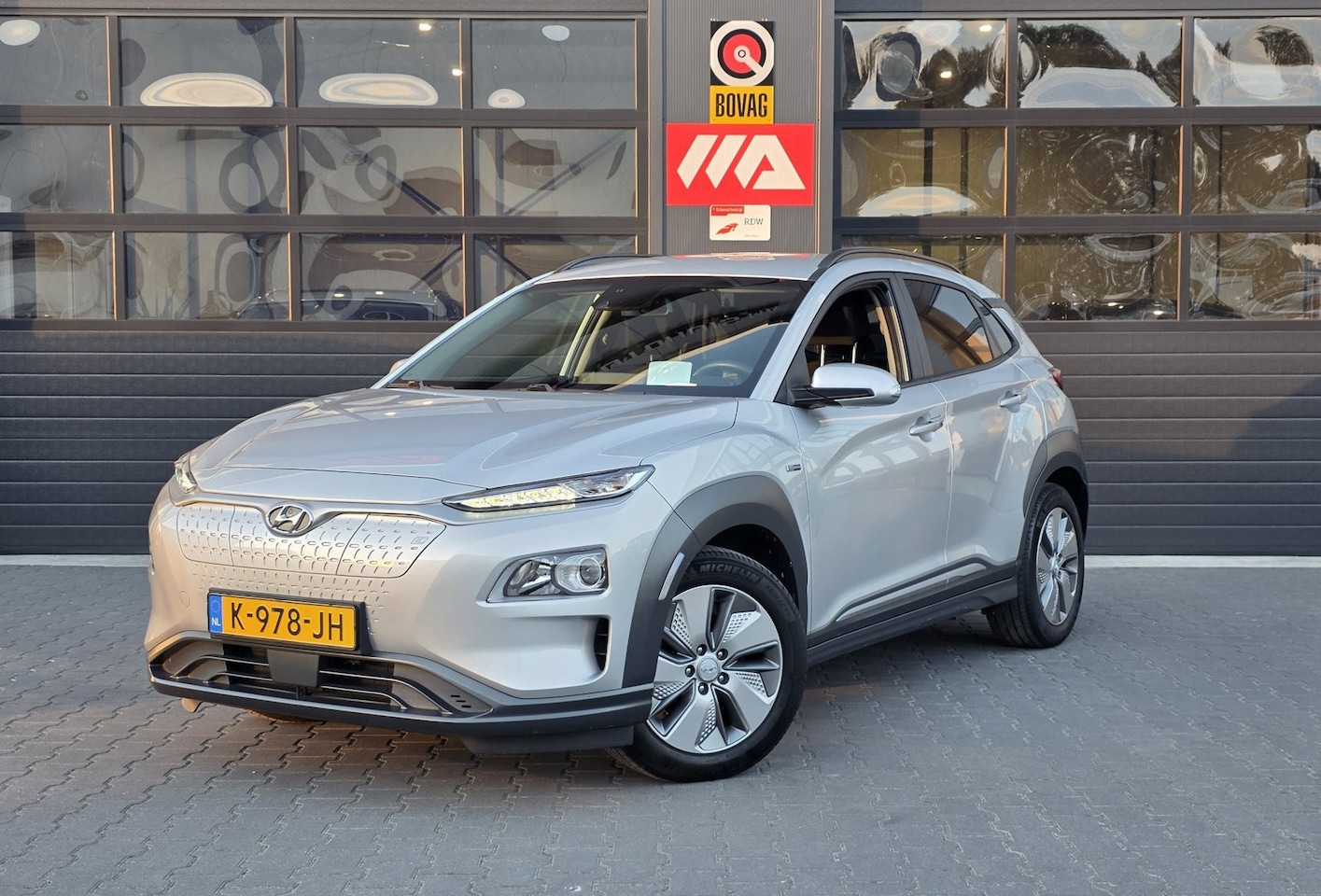 Hyundai Kona Electric - EV Fashion 64 kWh | 93% SOH | HEAD UP | CAMERA | KRELL | CARPLAY - AutoWereld.nl