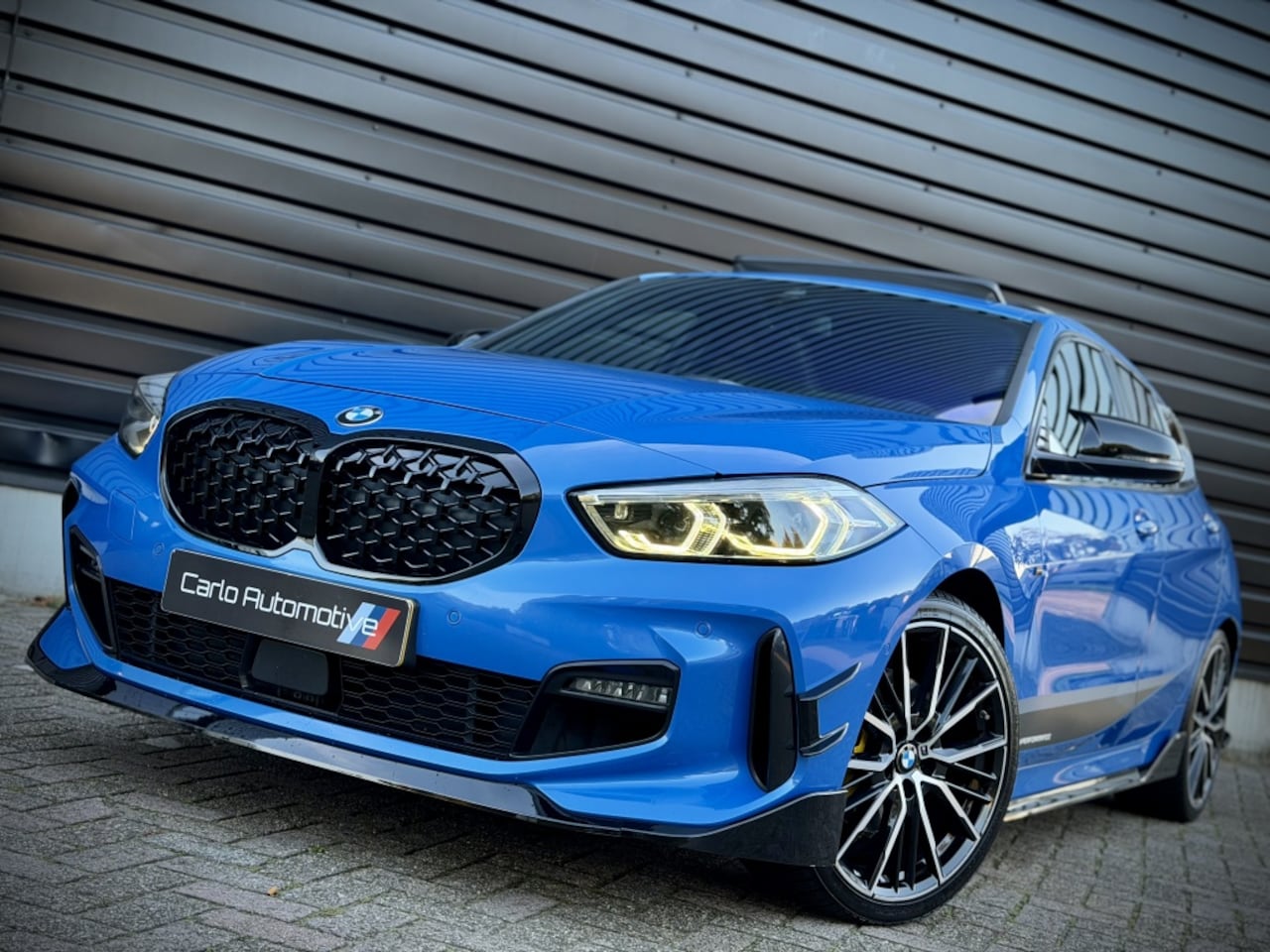 BMW 1-serie - 118i M-PERF. M135 PANO|SCHAALSTOEL|H/K|CAMERA VOL! - AutoWereld.nl