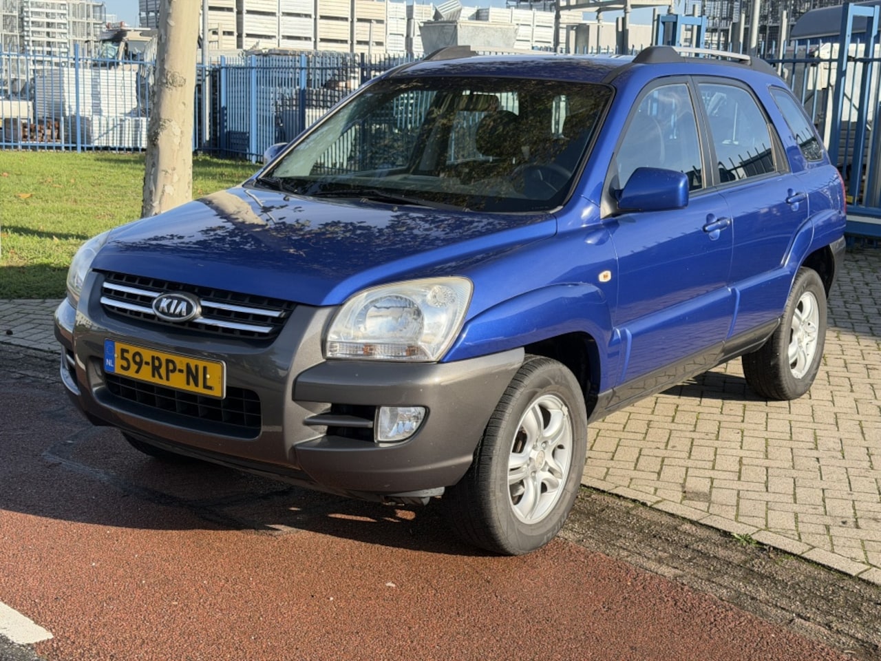 Kia Sportage - 2.0 CVVT Executive 2.0 CVVT Executive - AutoWereld.nl