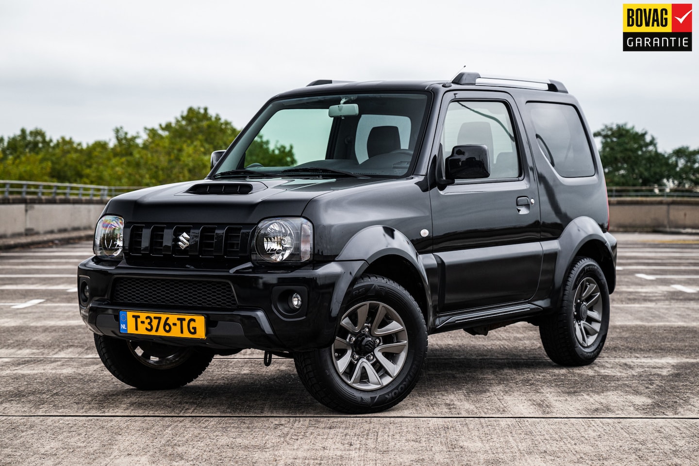 Suzuki Jimny - 1.3 Exclusive | Airco | Centrale Deurvergrendeling | Elektrische Ramen | LM Velgen | Trekh - AutoWereld.nl