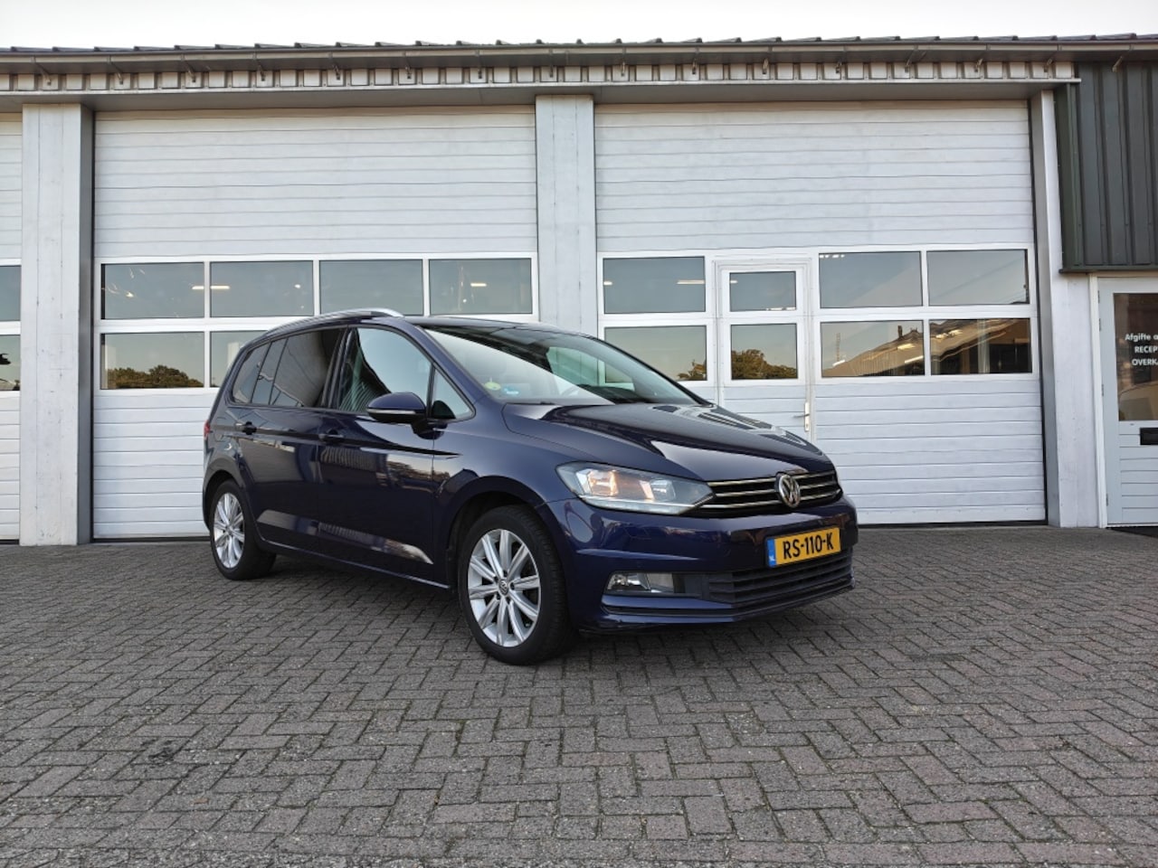 Volkswagen Touran - 1.6 TDI 77KW DSG-7 Highline 7 pers. - AutoWereld.nl