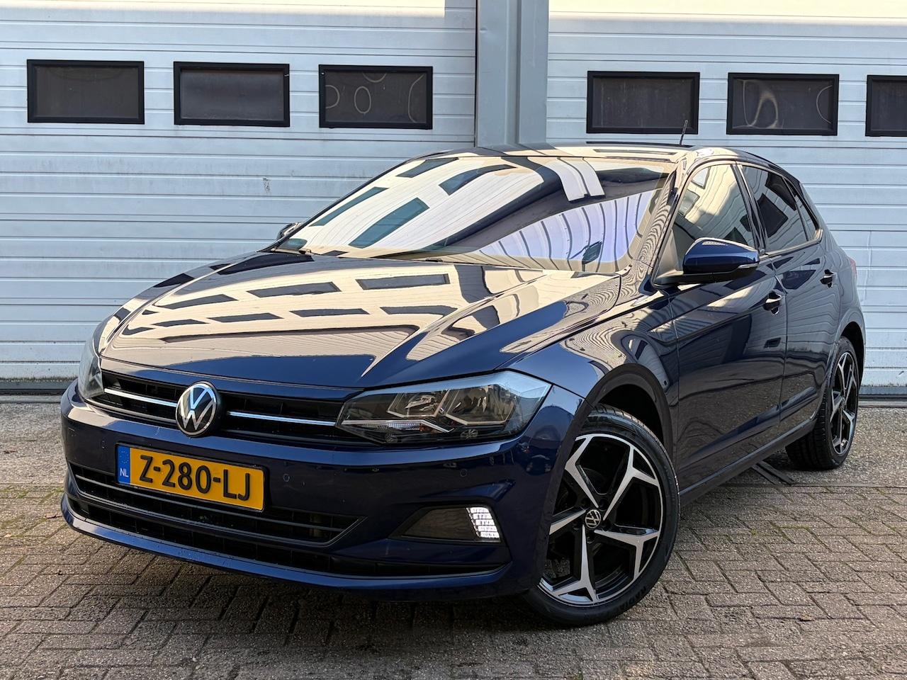 Volkswagen Polo - 1.0 TSI Highline aut/carplay/navi/front assist/parkeersensoren/virtual - AutoWereld.nl