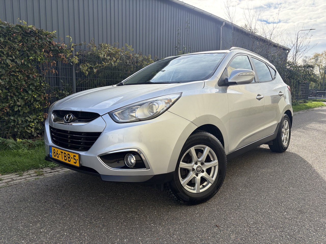 Hyundai ix35 - 1.6i GDI Business Edition / NAVI / AIRCO ECC / CRUISE / TREKHAAK - AutoWereld.nl