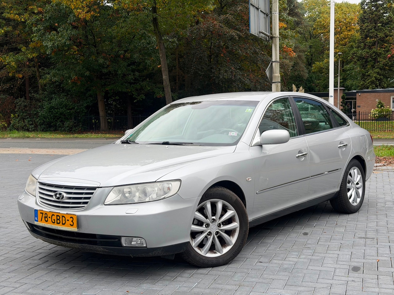 Hyundai Grandeur - 3.3i V6 Style Automaat/Airco/Cruise/LMV/PDC/NAP - AutoWereld.nl