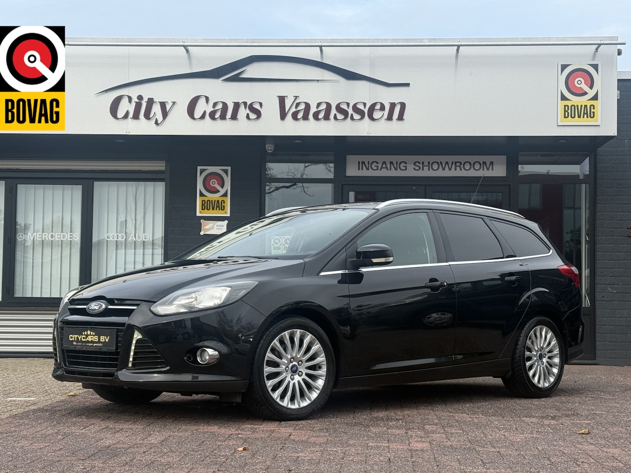 Ford Focus Wagon - 1.6 EcoBoost Titanium 150 pk org nl auto nap logisch navi climate ctr cruise ctr lmv 16 in - AutoWereld.nl