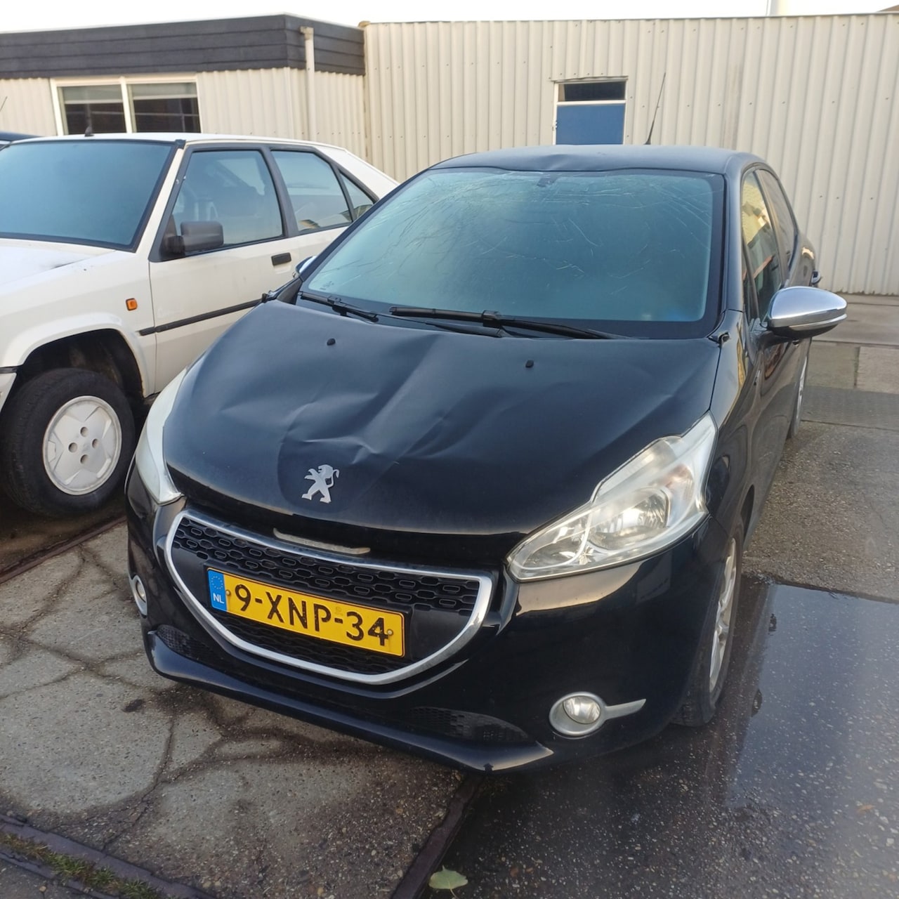 Peugeot 208 - 1.2 e-VTi Style RIJDBARE SCHADE! 135.000 KM! AUTOMAAT! - AutoWereld.nl