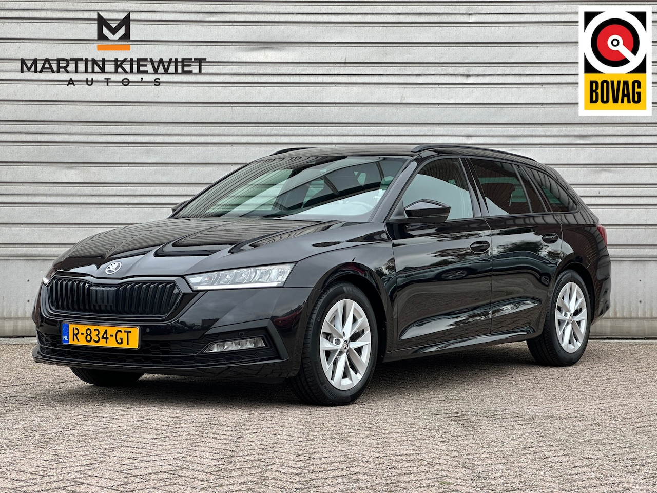 Skoda Octavia Combi - 1.0 TSI Sport Business|17"|PDC V+A|Sportstoelen|Climate|Cruise Control - AutoWereld.nl