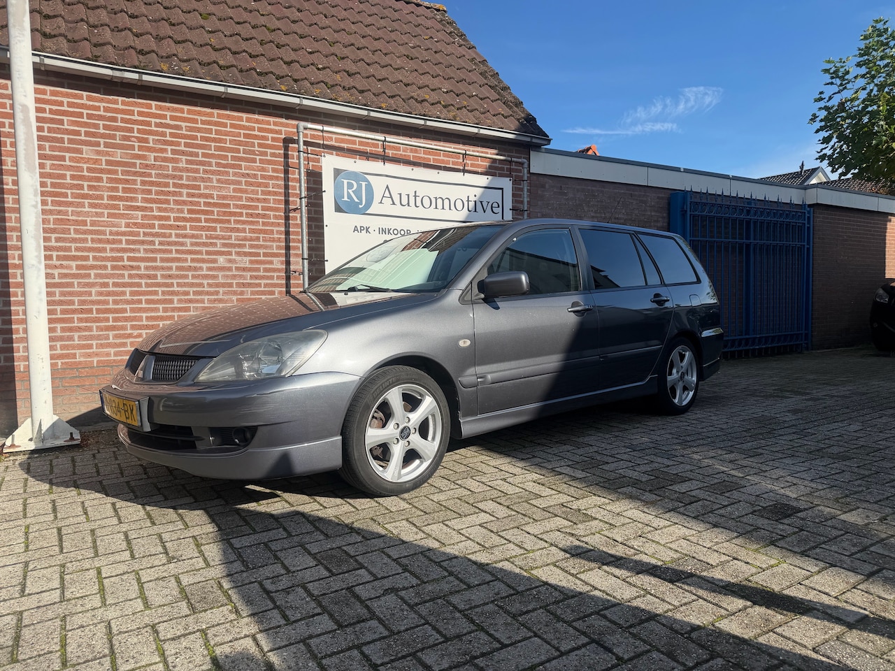 Mitsubishi Lancer Station Wagon - 1.6 Base APK/AIRCO - AutoWereld.nl