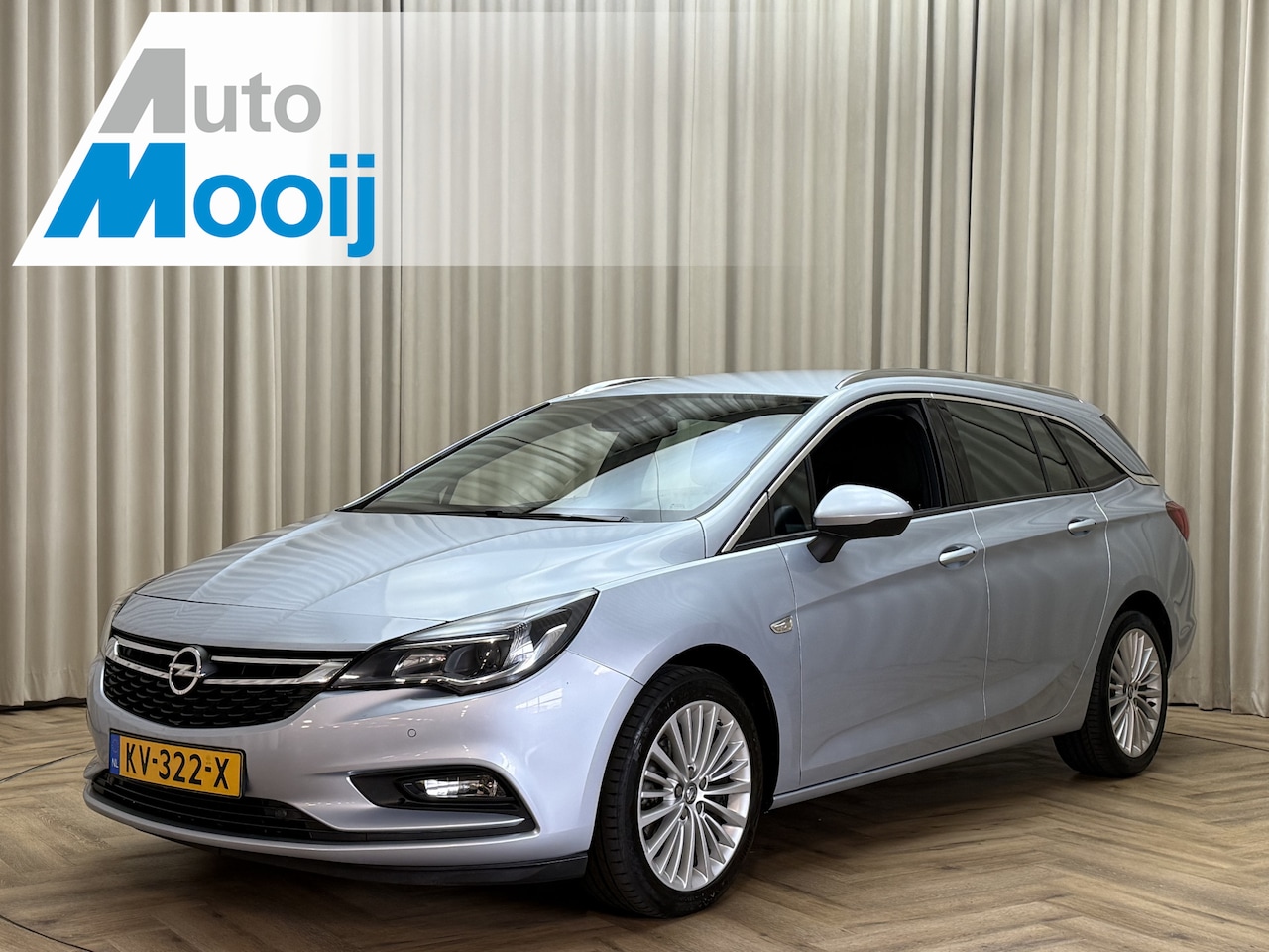 Opel Astra Sports Tourer - 1.4 Innovation Org.NL! / Keyless / 1/2 Leder / Adapt. Cruise / Carplay / Navigatie / 17'' - AutoWereld.nl