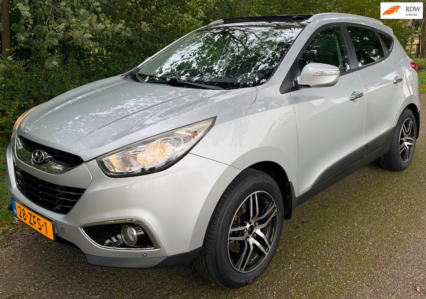 Hyundai ix35 - 1.6i GDI Style 2011 NAP PANO CLIMA TREKHAAK - AutoWereld.nl