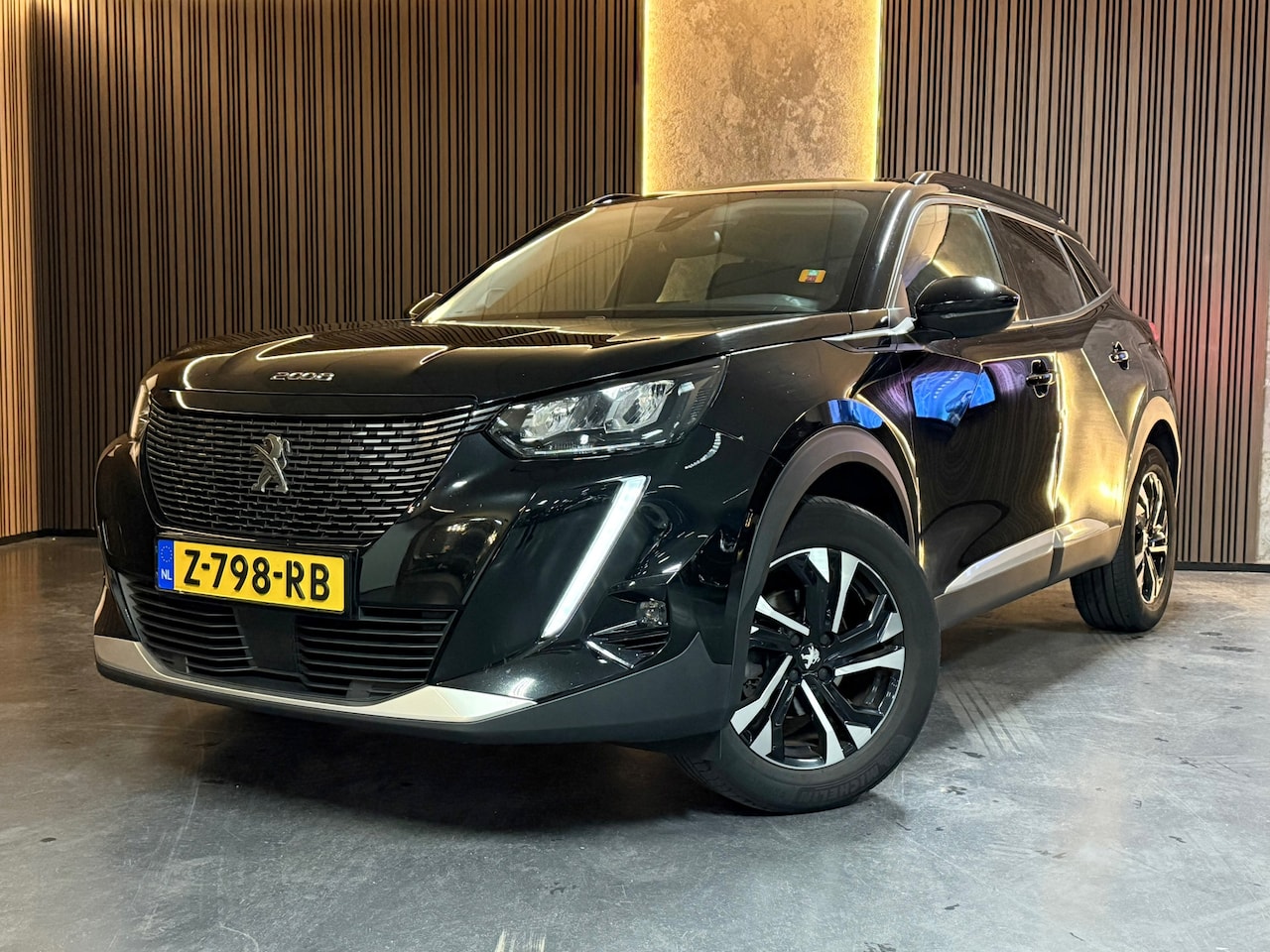 Peugeot 2008 - 1.2 PureTech Allure Pack Navi Camera Cruise Led - AutoWereld.nl