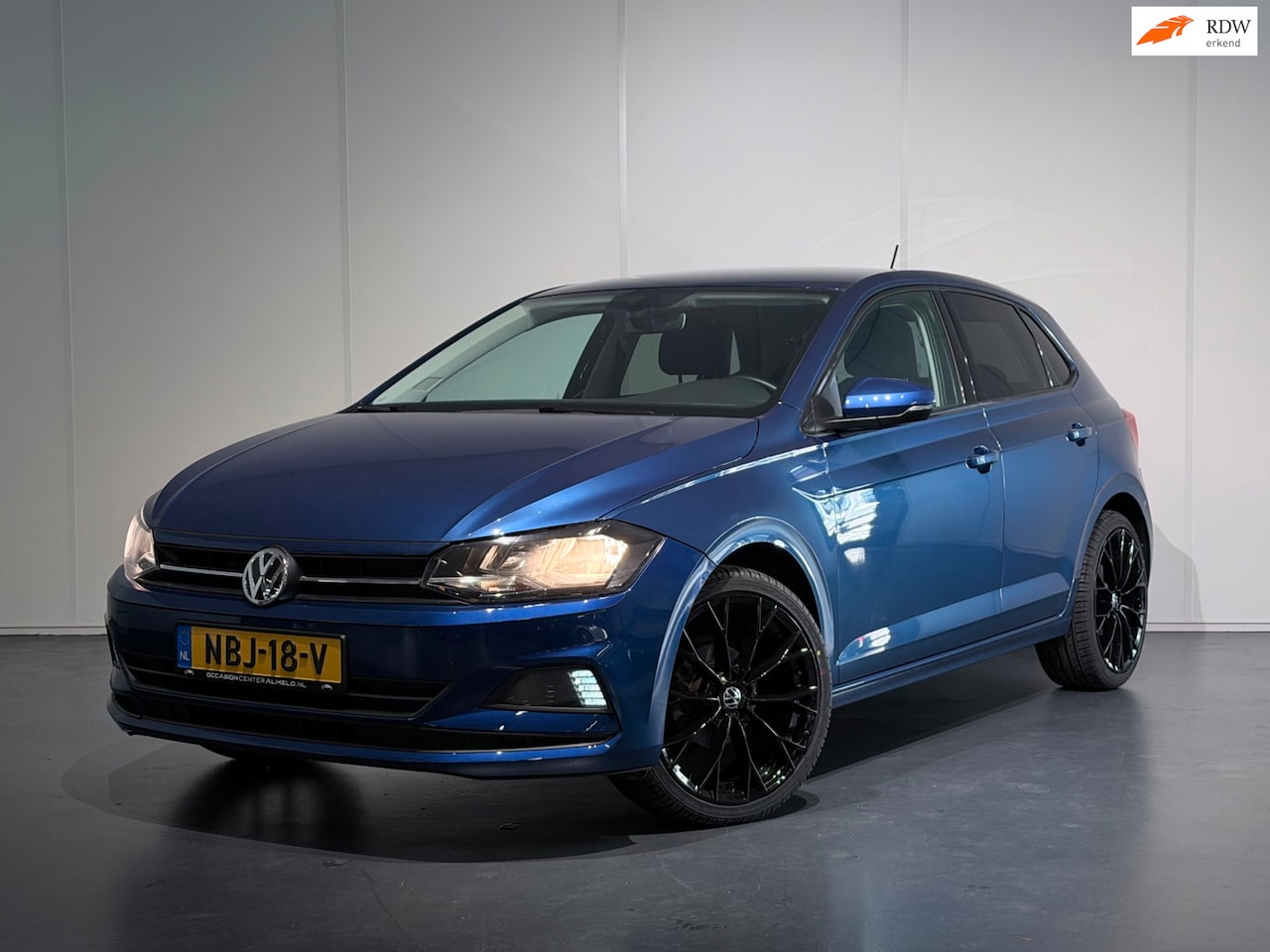 Volkswagen Polo - 1.0 TSI Comfortline /Clima/ACC/Bots/Stoelverwarming/18'' - AutoWereld.nl