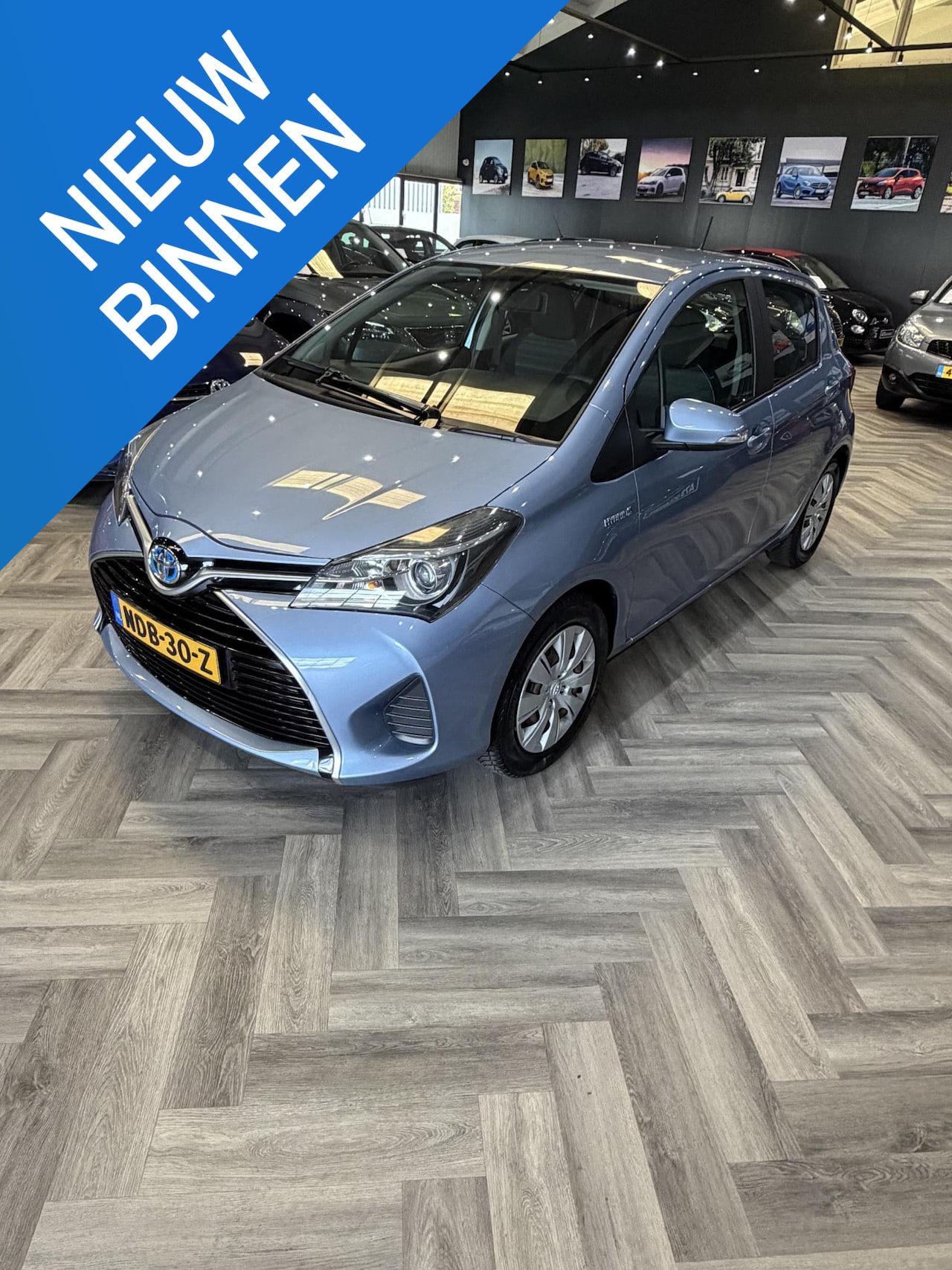 Toyota Yaris - 1.5 Hybrid Aspiration Eerste eigenaar,weinig gelopen - AutoWereld.nl