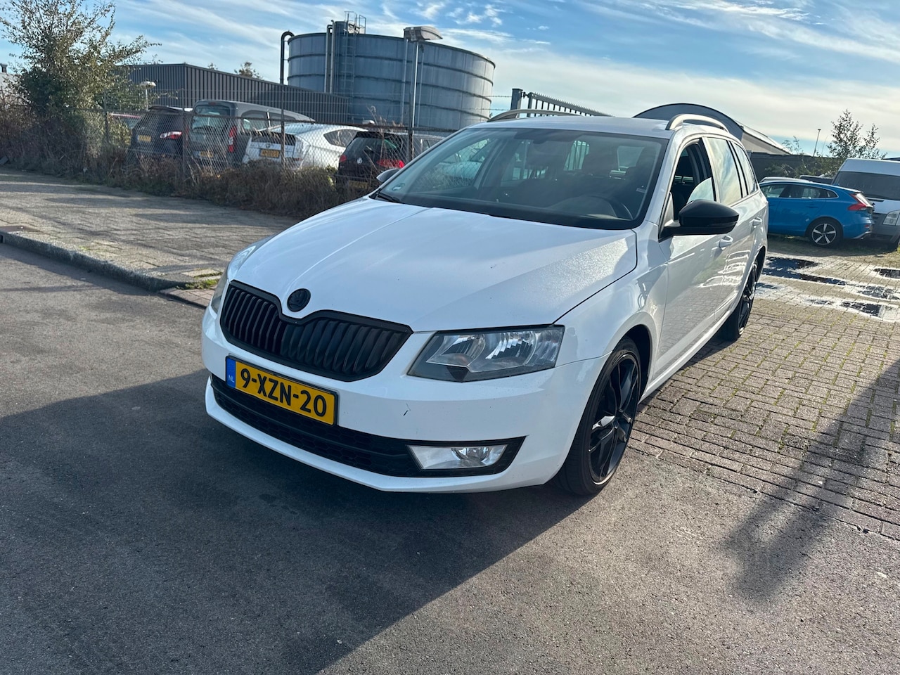 Skoda Octavia Combi - 1.6 TDI NAVI/CLIMA/PDC - AutoWereld.nl