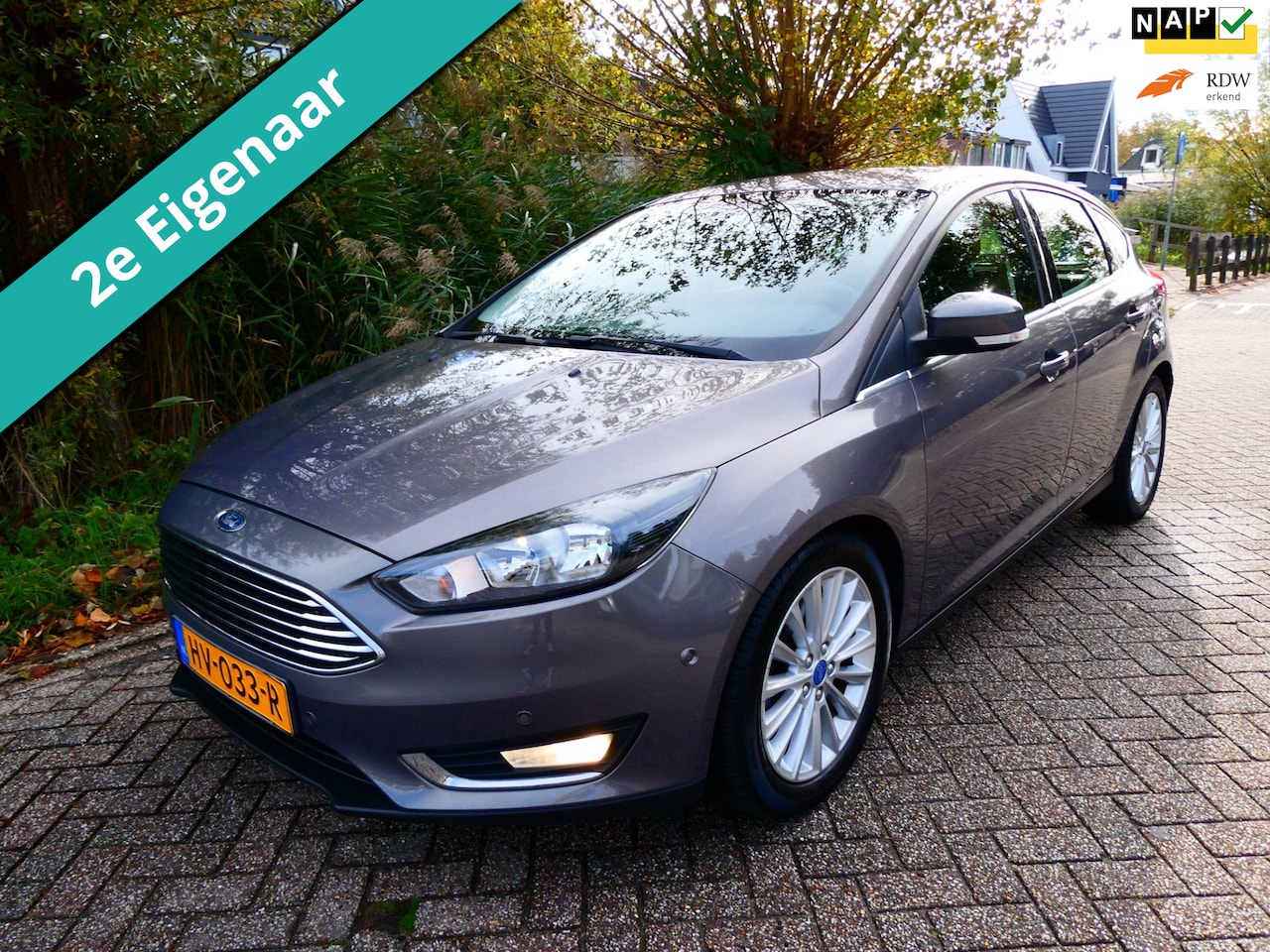 Ford Focus - 1.5i 150pk Titanium Automaat Clima Navi Trekhaak 1500kg. - AutoWereld.nl
