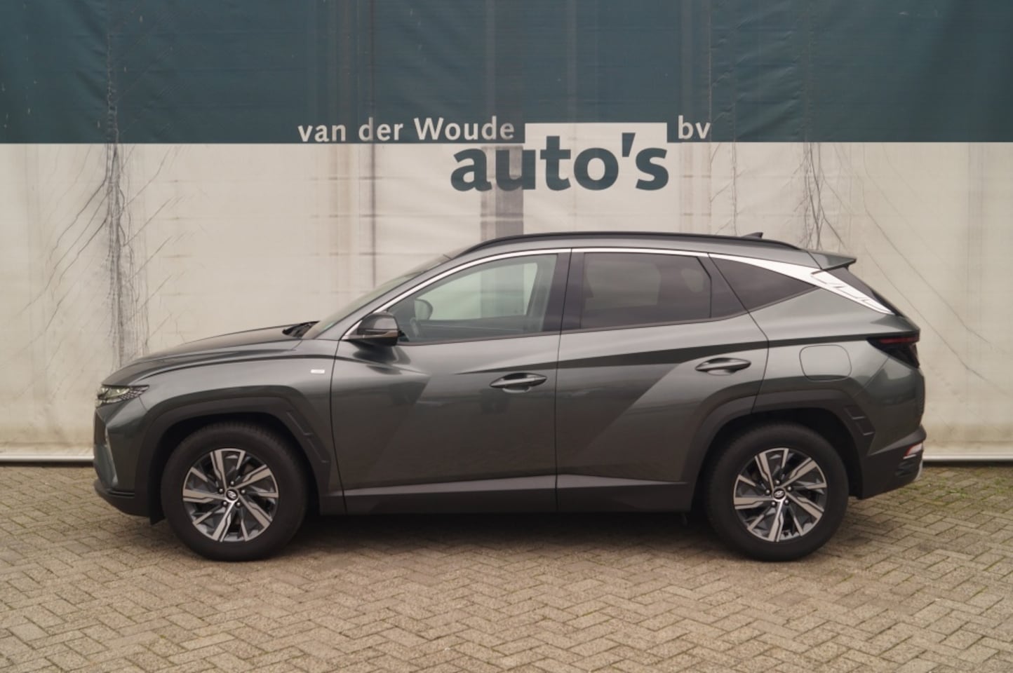 Hyundai Tucson - 1.6 T-GDI MHEV Comfort Smart -NAVI-ECC-PDC- - AutoWereld.nl