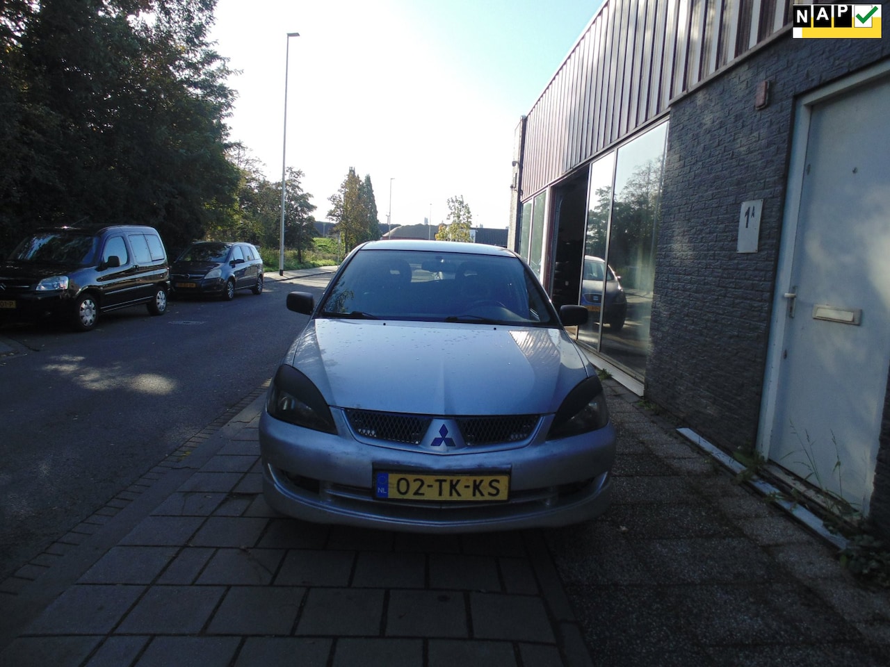 Mitsubishi Lancer Station Wagon - 2.0 Intense Edition2006 MET AIRCO - AutoWereld.nl