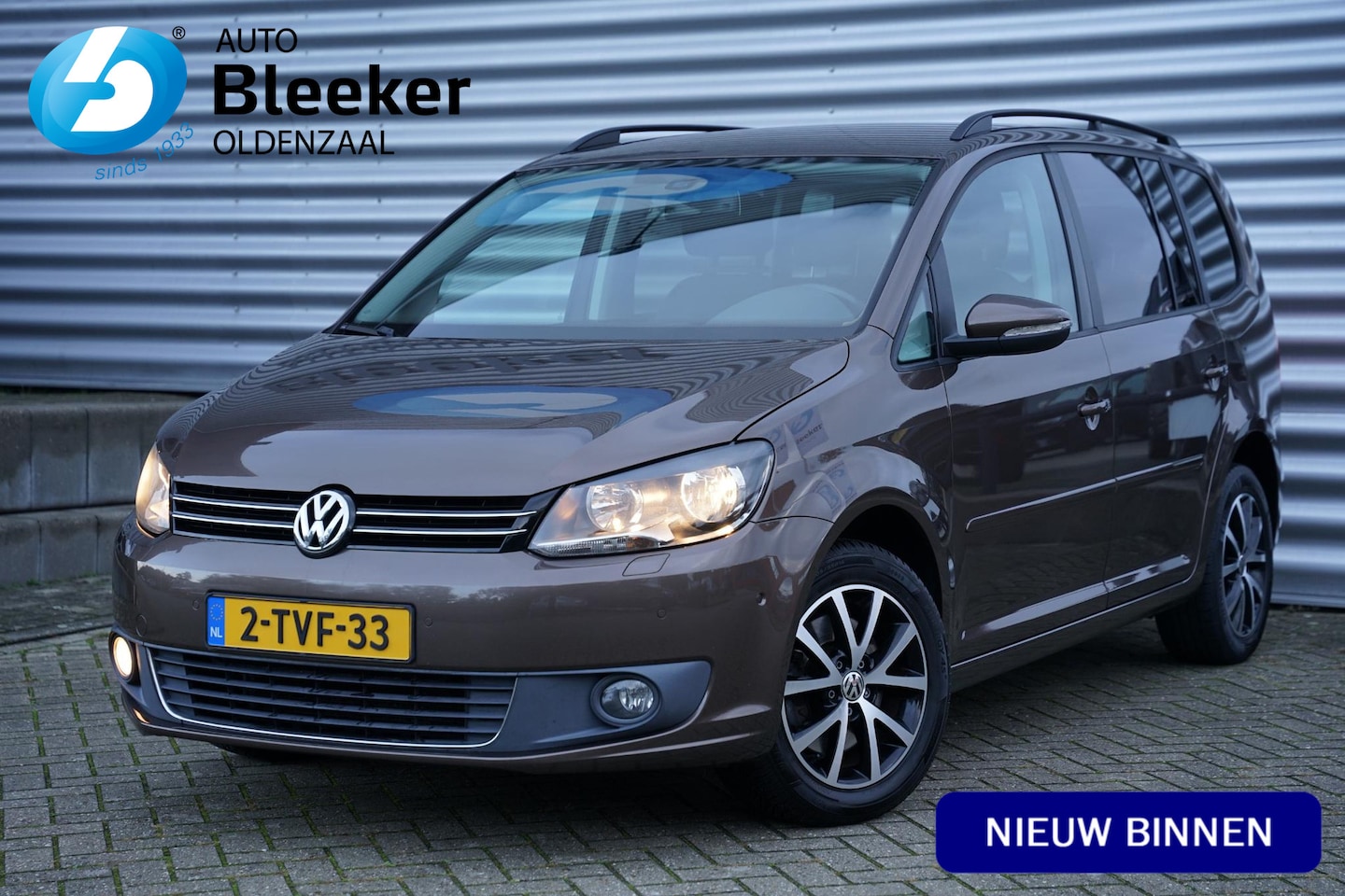 Volkswagen Touran - 1.4 TSI Comfortline 7p. Aut. Ecc Cruise LM - AutoWereld.nl