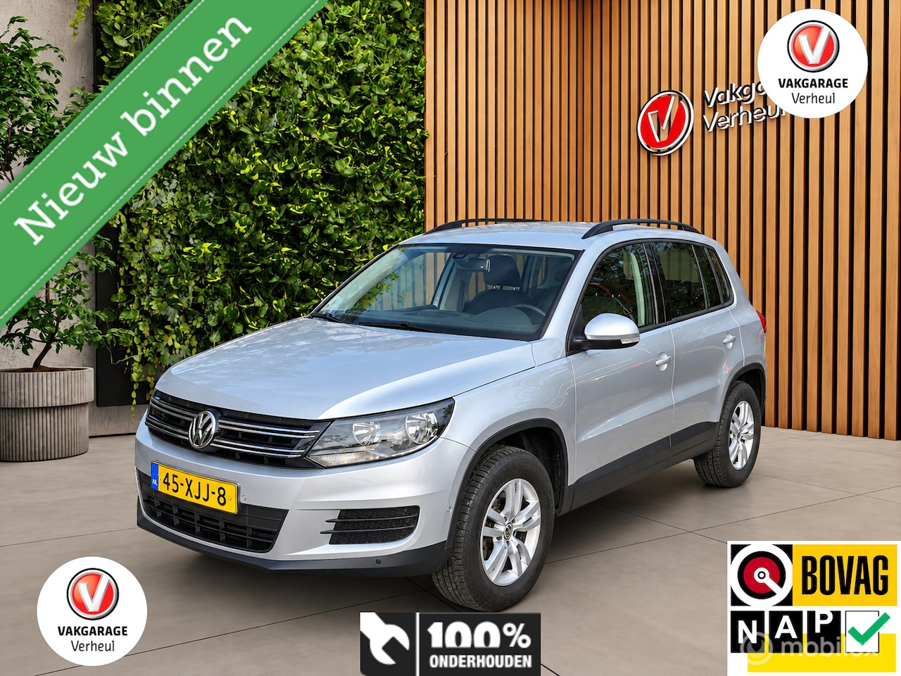 Volkswagen Tiguan - 1.4 TSI Comfort&Design ✅NAP ✅Trekhaak ✅ Dealerauto - AutoWereld.nl