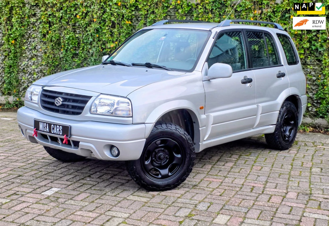 Suzuki Grand Vitara - 2.0 Automaat 4x4 Airco Trekhaak APK Wilde Body - AutoWereld.nl