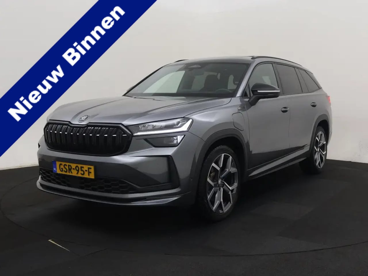 Skoda Kodiaq - 1.5 TSI PHEV Sportline Business Panodak | Canton | Trekhaak | Led | Winterpakket ORG NL - AutoWereld.nl