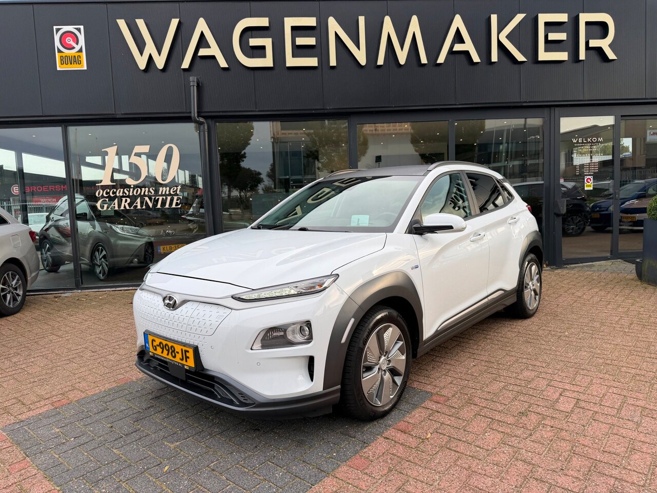 Hyundai Kona Electric - EV Premium 64 kWh ACC|NAV|Cam|Leder|FULL OPTION - AutoWereld.nl
