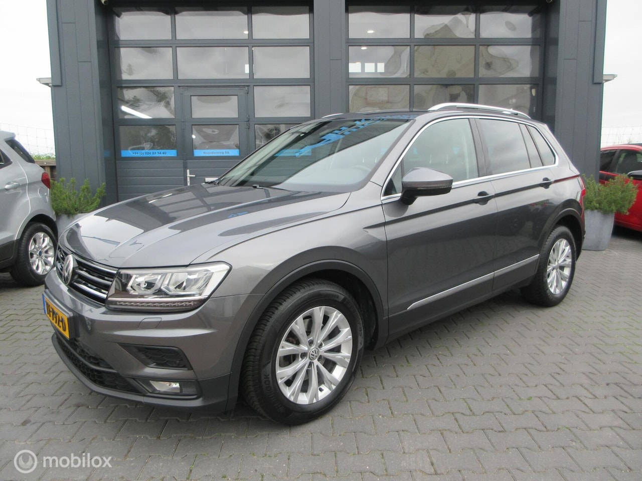 Volkswagen Tiguan - 1.4 TSI ACT Highline Automaat 125dkm - AutoWereld.nl