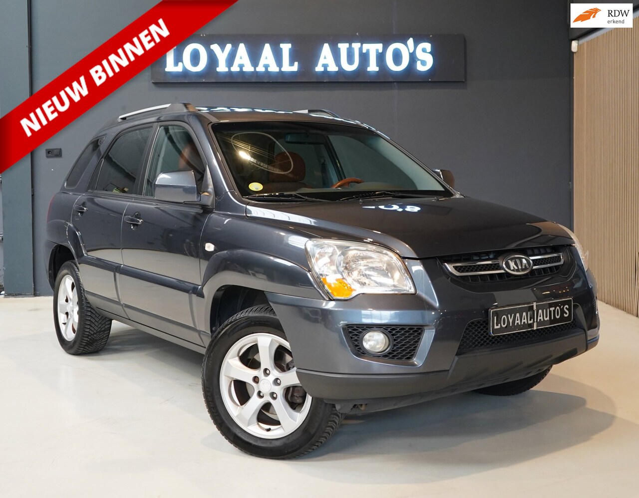 Kia Sportage - 2.0 CVVT Fifteen | CRUISE | STOELVER. | TREKHAAK | AIRCO | NAP | APK - AutoWereld.nl