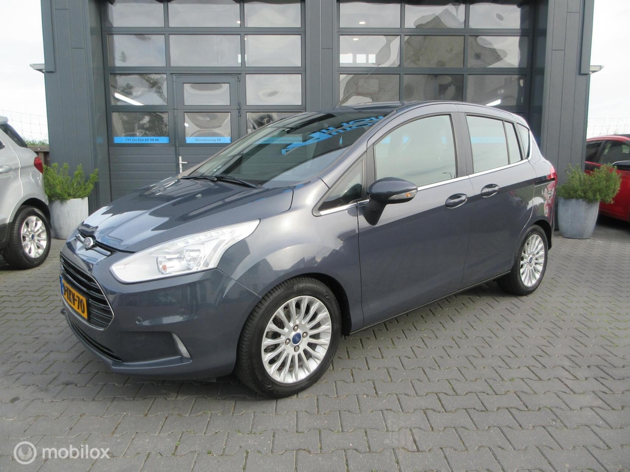 Ford B-Max - 1.0 EcoBoost Titanium 74dkm! Airco Trekhaak Camera Cruise 2e Eig - AutoWereld.nl